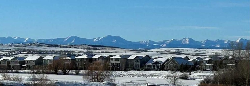 ROCKY MOUNTAINS FROM AIR RANCH OKOTOKS